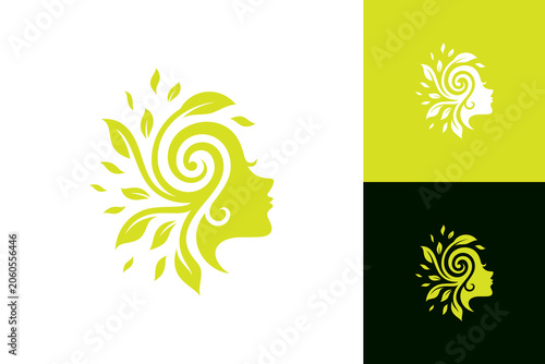 Women's beauty and health logo, with the concept of a woman's head silhouette decorated with spread leaves