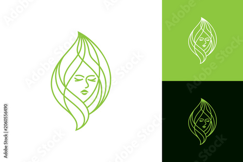Beauty and health care logo, with the concept of leaf shape and woman's face inside