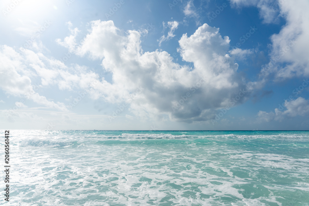 Fototapeta premium Caribbean Sea Horizon and Blue Sky with clouds. Summer beach background. Panoramic view of turquoise ocean