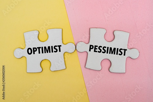 Fotografie "OPTIMIST, PESSIMIST" word alphabet letters on puzzle