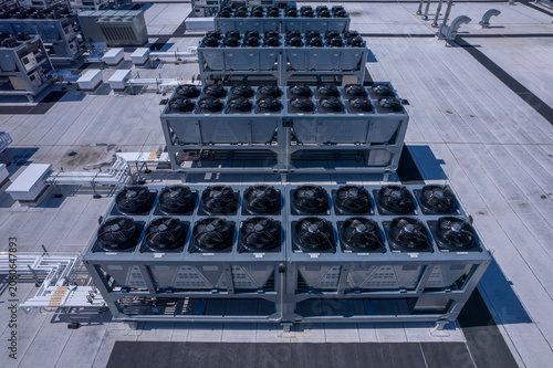 Aerial view of Hyperscale Datacenter, AI data center cooling systems, piping electrical equipment. Chilling equipment and electrical substations generators