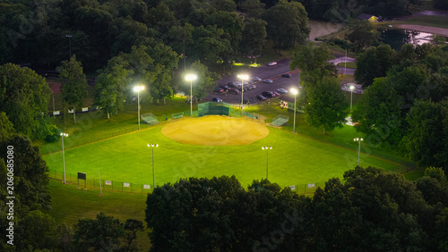 Obraz na plátně A lit up softball field at Mill Woods Park in Wethersfield, Connecticut at sunse