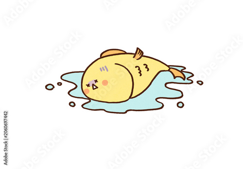 Fotografija Fish washed ashore with a painful expression, fish out of water idiom or uncomfo