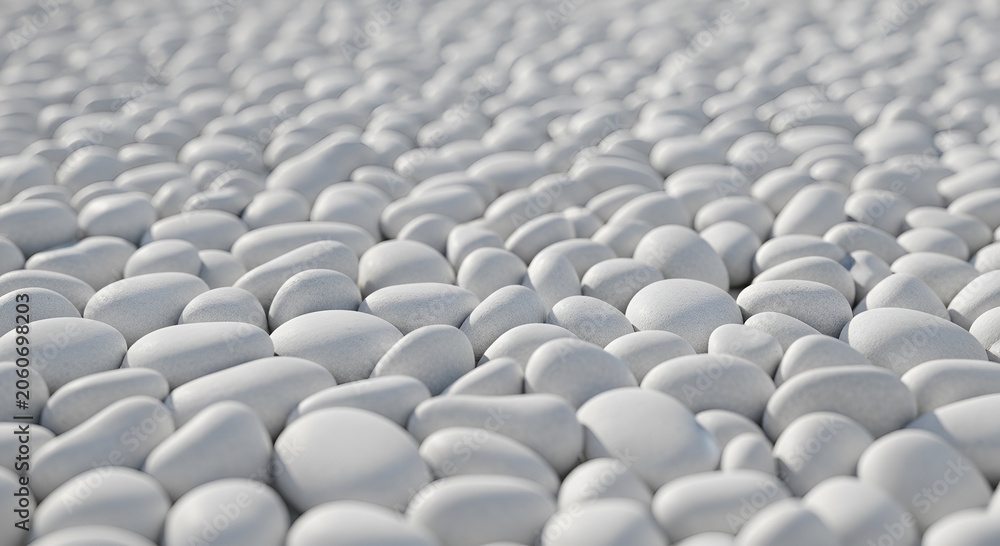 Obraz premium High angle view of continuous texture full of small white smooth pebbles under soft light