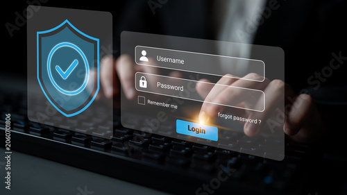 фотографія A user engaging in a secure login process, typing credentials on a keyboard while interacting with a digital interface highlighting security features and protection measures