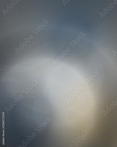 Dramatic sun rays shining through blue sky