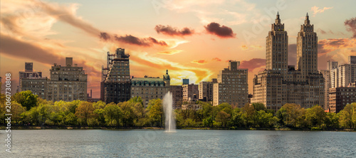 Skyline panorama with Eldorado building and reservoir with fountain in Central Park in midtown Manhattan in New York City