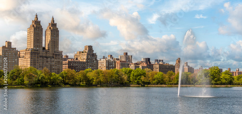 Skyline panorama with Eldorado building and reservoir with fountain in Central Park in midtown Manhattan in New York City