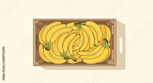 Top down view of a wooden crate filled to the brim with ripe yellow bananas on a light cream colored background.