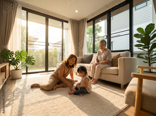 Happy multi generation family playing together in sunny living room