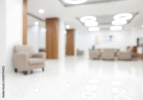 Blurred view of a modern office lobby with comfortable seating