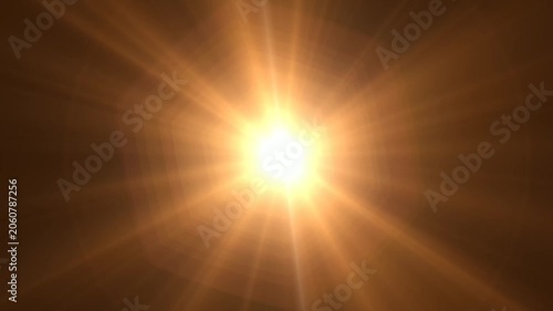 Abstract bright light burst with optical lens flare,Bright explosion of fire and light in a starry night sky with a optical lens flare.