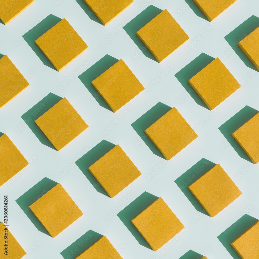 Fototapeta premium Pattern of yellow sticky notes on a light blue background arranged in a repetitive grid, casting soft shadows for office and brainstorming concepts
