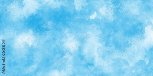 Bright painted sky blue watercolor background, Abstract blue sky with clouds,Aquarelle paint paper textured canvas element for text design. vector pastel color paint stain. Blue watercolor background,