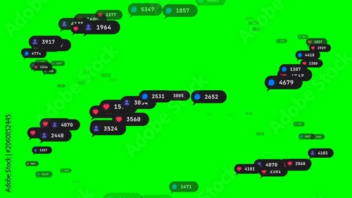 Social media notification bubbles rising with heart comment and follower icons on green screen chroma key background overlay