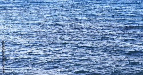 Majestic dark and cold water current in northern sea in slow motion. Beautiful nature 4K video background