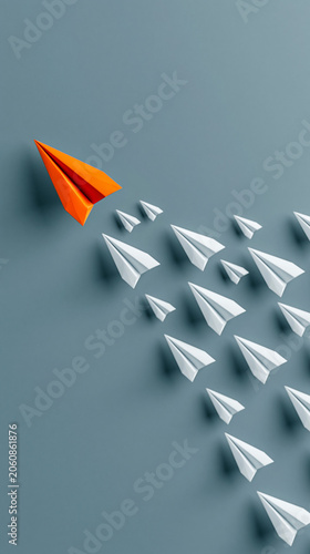 Leadership in Flight: A vibrant orange paper airplane leads a fleet of white paper airplanes in formation, symbolizing guidance and the power of innovation.