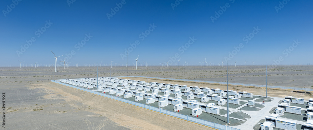 Obraz premium Energy Storage Power Station with Wind Farm in the Gobi Desert