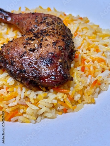 Grille fried chicken thighs with peppers and basmati rice