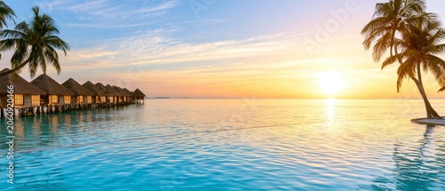 Luxury resort booking for a tropical vacation at a beachfront resort - travel banner with stunning sunset view