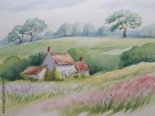 White House with Red Roof in Green Countryside Landscape with Trees and Wildflowers