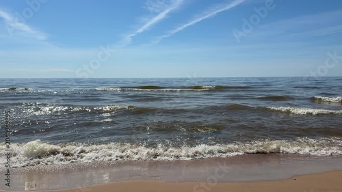 Baltic Sea coastline and gentle surf in Jurmala Latvia