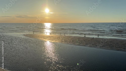 Sunset over Baltic Sea beach in Jurmala Latvia travel destination