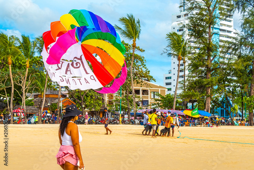 Tableau sur toile People tourism on parasailing parachute sport activity Patong Phuket Thailand