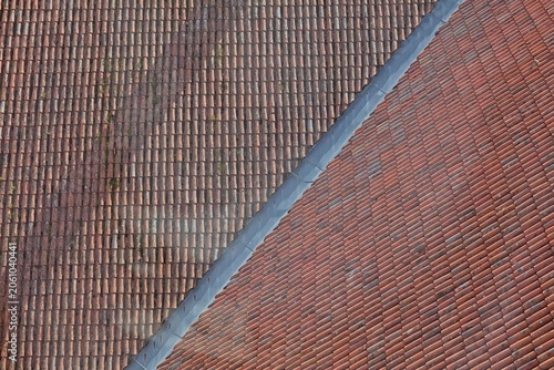 Foto Roof valley flashing, which channels water down the intersection of two sloping roof angles, Estonia, Europe