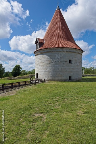 Artillery tower (Suurtükitorn) located at Kuressaare Episcopal Castle (Kuressaare Castle) on Saaremaa in summer with clouds in the sky, Estonia, Europe.