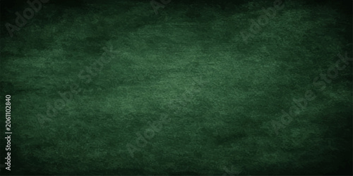 Εκτύπωση καμβά A textured dark green chalkboard serves as a blank canvas, its surface slightly worn, hinting at countless lessons and creative expressions