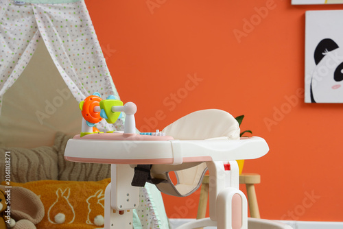 Baby walker in childrens pl...