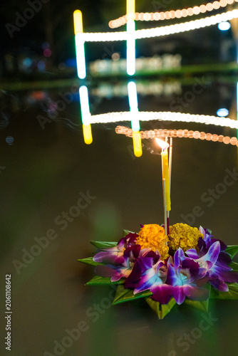 Loy Krathong festival. Krathong floating in a pond for forgiveness, dedicated to the Goddess Ganges, celebrated in Thailand.