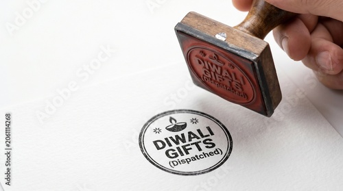 Diwali Gifts Dispatched rubber stamp on white paper, traditional wooden hand stamp for festive shipping, Hindu festival gift packaging and logistics