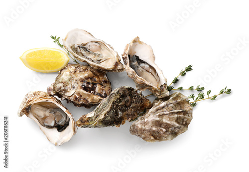 Fresh raw oysters with lemo...
