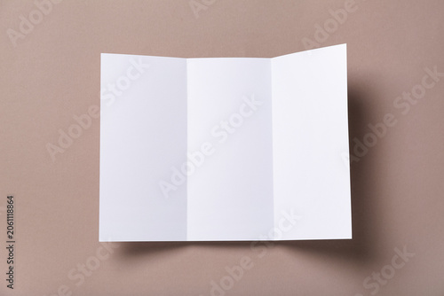 Blank brochure on brown bac...
