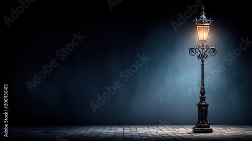 Ornate antique street lamp illuminates a dark, textured outdoor setting
