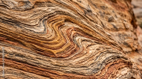 Abstract Nature Background of Swirling Layered Sandstone Rock Texture