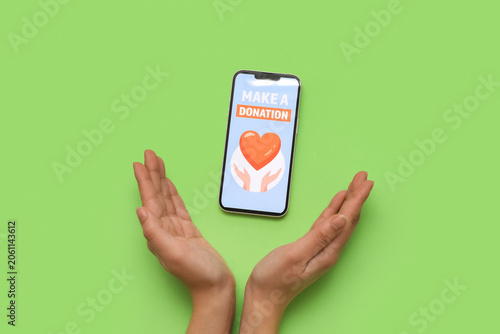 Female hands and mobile pho...
