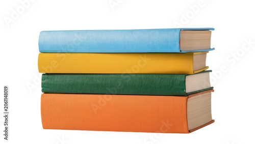 Photos Stack of four hardcover books in blue yellow green, and orange