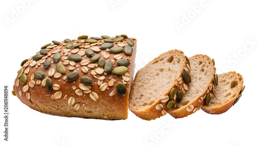 Tablou pe pânză Whole grain bread loaf with pumpkin seeds and oats, sliced