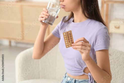Beautiful young woman with ...