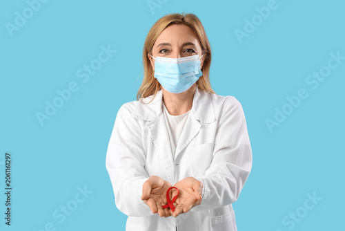 Mature female doctor with f...