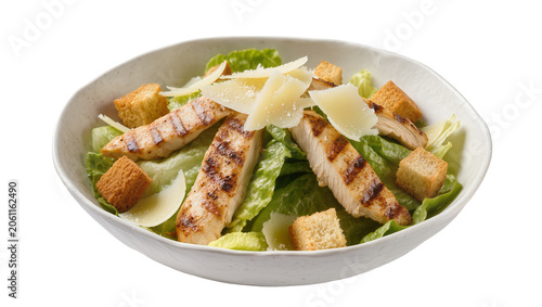 Fotografie Grilled chicken caesar salad with croutons and parmesan shavings