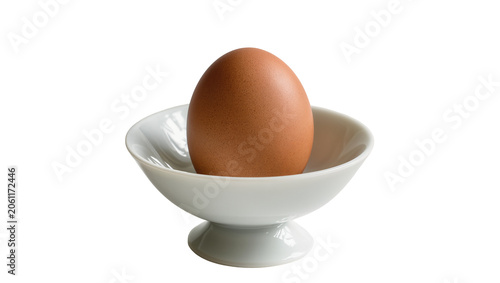 Bild auf Leinwand Brown egg in white egg cup