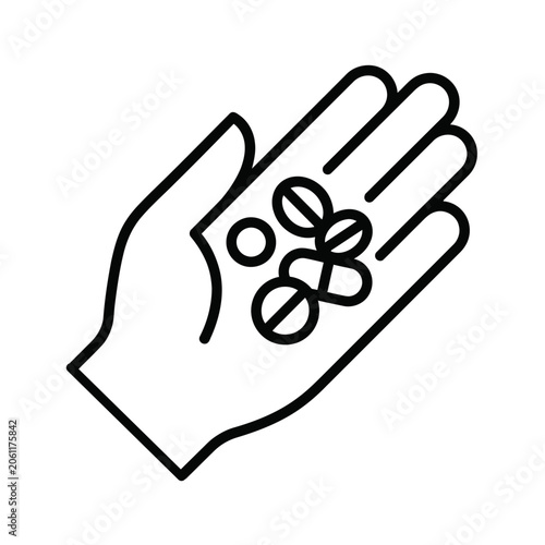 Pills in Hand: A hand holds a collection of pills and capsules, representing medication and healthcare.
