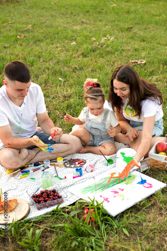 Happy Family Summer Picnic in the Park, Outdoor Lifestyle, Parents and Children Enjoying Nature, Food, Fun Activities, Sunshine, Relaxation, Togetherness and Joyful Weekend Moments