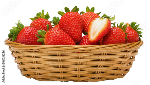Cuadro en lienzo Wicker basket full of fresh ripe strawberries, one cut in half