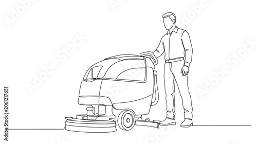 Man using industrial floor cleaning machine.