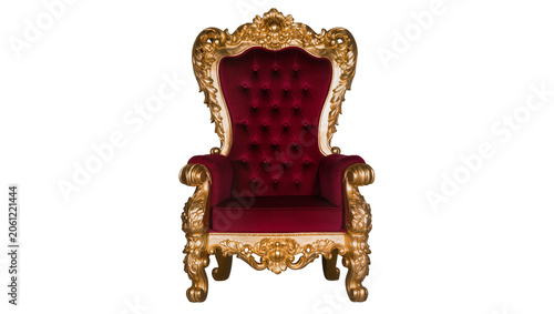 Foto Ornate red velvet throne chair with gold carved details